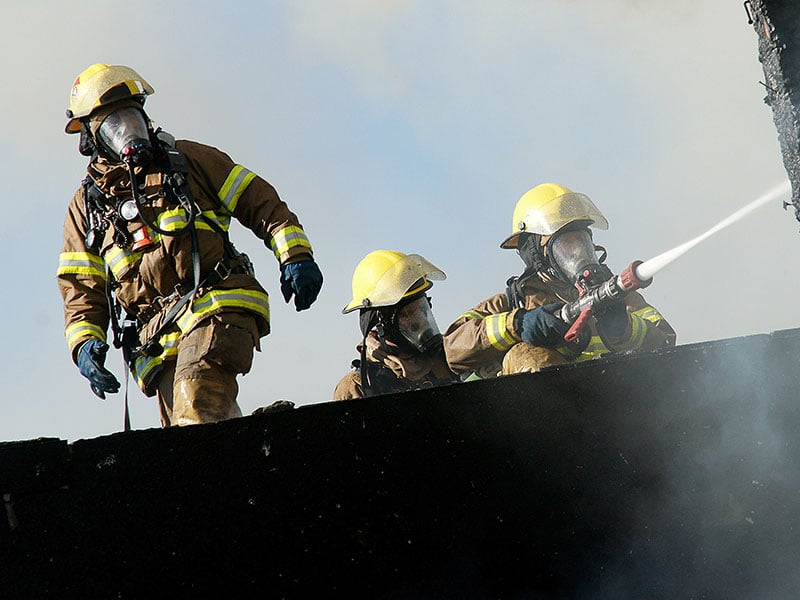 Firefighters at the scene of a fire