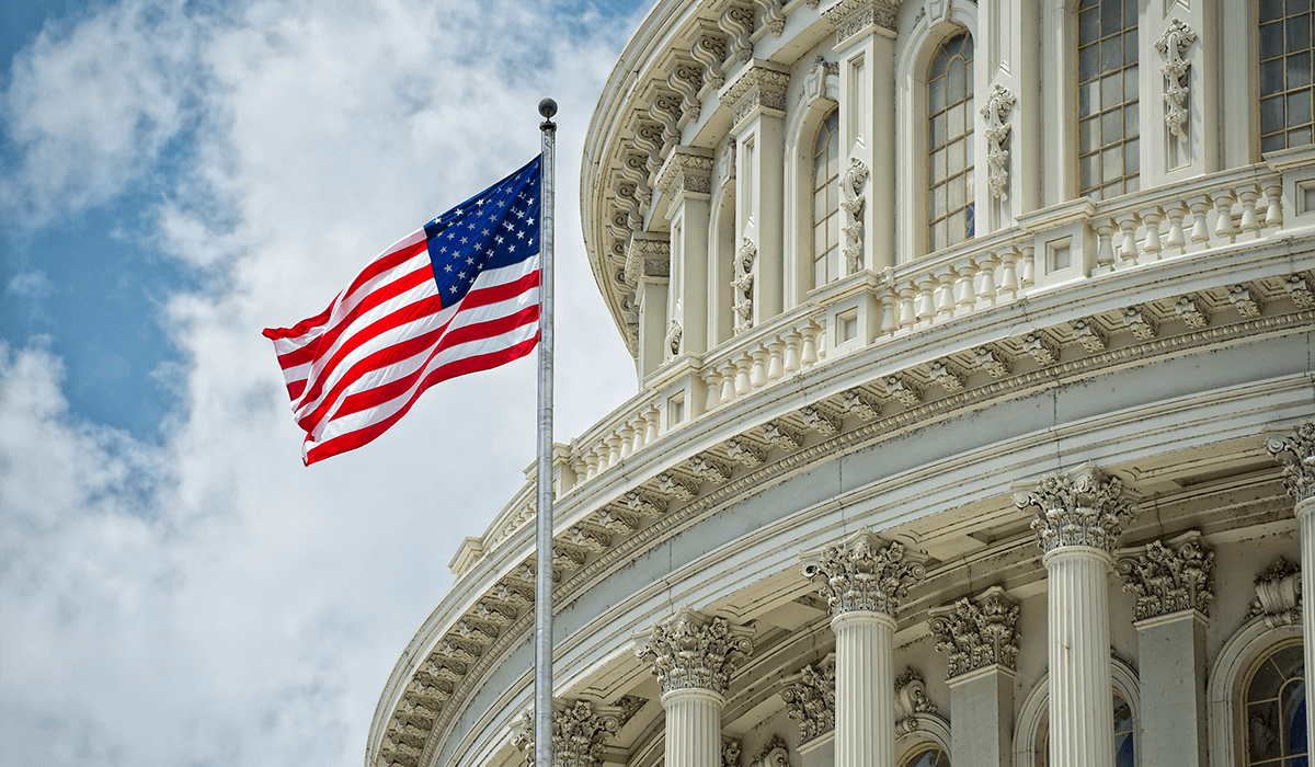 flag waving in front of the the capital building in DC - gfoa distinguished budget award